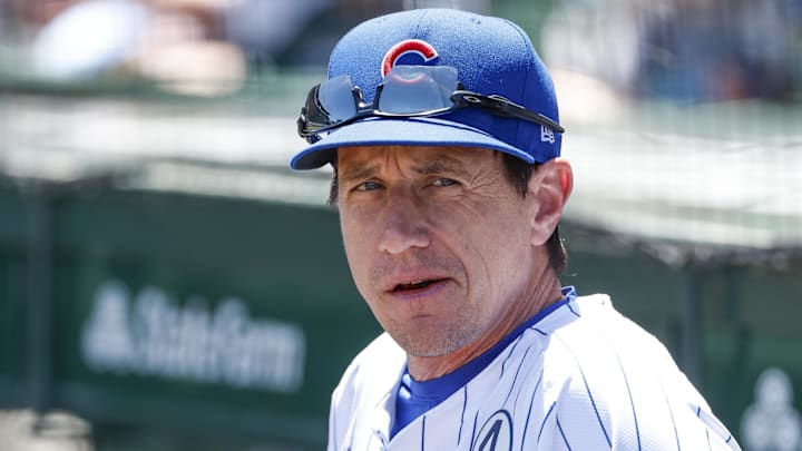 Jun 2, 2024; Chicago, Illinois, USA; Chicago Cubs manager Craig Counsell (30) looks on from the dugout before a baseball game against the Cincinnati Reds at Wrigley Field.
