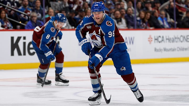 Nov 13, 2024; Denver, Colorado, USA; Colorado Avalanche right wing Mikko Rantanen (96) controls the puck in the second period against the Los Angeles Kings at Ball Arena. Mandatory Credit: Isaiah J. Downing-Imagn Images