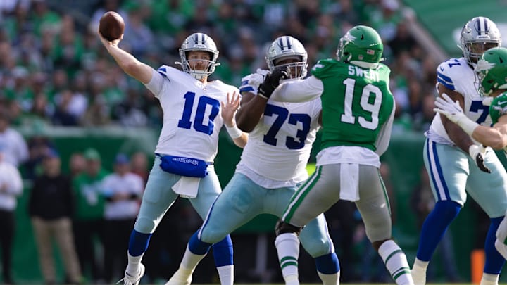 Dallas Cowboys quarterback Cooper Rush (10) passes the ball against the Philadelphia Eagles during the first quarter at Lincoln Financial Field. Dallas Cowboys quarterback Cooper Rush (10) passes the ball against the Philadelphia Eagles during the first quarter at Lincoln Financial Field.