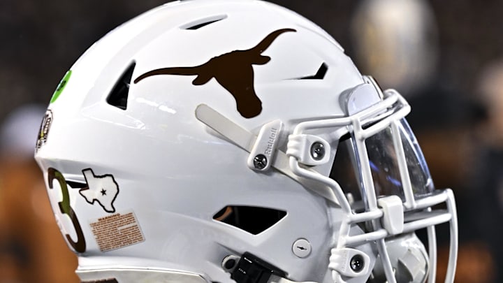 Nov 30, 2024; College Station, Texas, USA; A detail view of a Texas Longhorns helmet on the sideline during the first quarter against the Texas A&M Aggies. The Longhorns defeated the Aggies 17-7 at Kyle Field. Mandatory Credit: Maria Lysaker-Imagn Images  