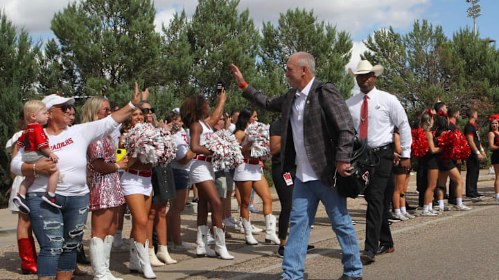 Sep 16, 2023; Lubbock, Texas, USA;  Texas Tech Red Raiders head coach Joey McGuire greets fans outside Jones AT&T Stadium and Cody Campbell Field before the game against the Tarleton State Texans. Mandatory Credit: Michael C. Johnson-Imagn Images