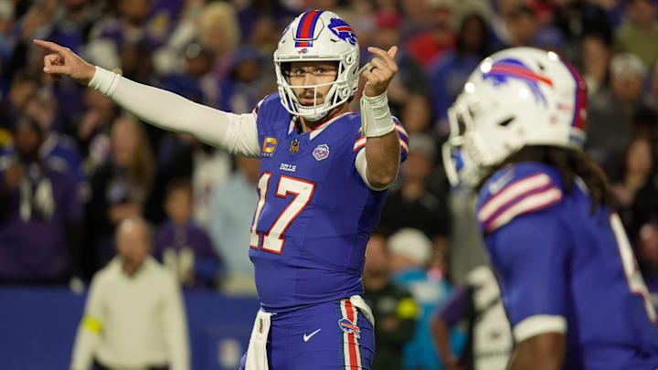 Buffalo Bills quarterback Josh Allen signals to running back James Cook against the Baltimore Ravens at Highmark Stadium on Sept. 7, 2025.