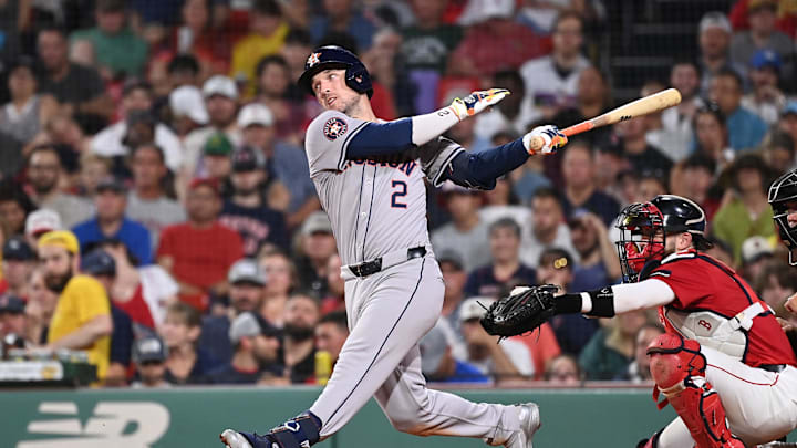Aug 9, 2024; Boston, Massachusetts, USA; Houston Astros third baseman Alex Bregman (2) hits a single against the Boston Red Sox during the fifth inning at Fenway Park. Mandatory Credit: Eric Canha-Imagn Images