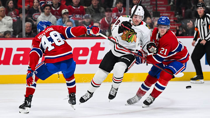 Apr 14, 2025; Montreal, Quebec, CAN; Montreal Canadiens defenseman Lane Hutson (48) and defenseman Kaiden Guhle (21) defend against Chicago Blackhawks center Ryan Donato (8) in the third period at Bell Centre. Mandatory Credit: David Kirouac-Imagn Images Apr 14, 2025; Montreal, Quebec, CAN; Montreal Canadiens defenseman Lane Hutson (48) and defenseman Kaiden Guhle (21) defend against Chicago Blackhawks center Ryan Donato (8) in the third period at Bell Centre. Mandatory Credit: David Kirouac-Imagn Images