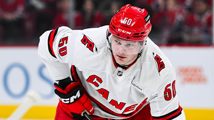 Carolina Hurricanes left wing Eric Robinson waits for a face-off against the Montreal Canadiens.
