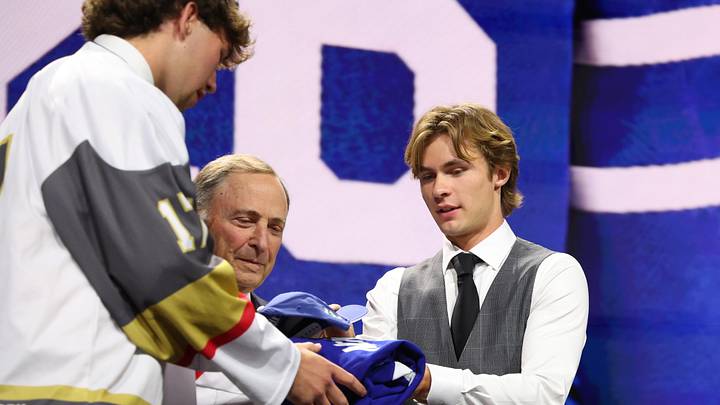 Jun 26, 2026; Buffalo, New York, USA; Gavin McKenna talks to NHL commissioner Gary Bettman after being selected with the first pick in the first round of the 2026 NHL Draft by the Toronto Maple Leafs at KeyBank Center. Mandatory Credit: Timothy T. Ludwig-Imagn Images