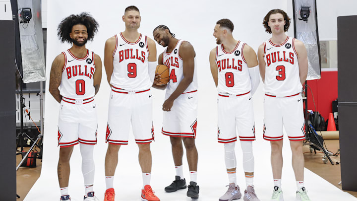 Sep 30, 2024; Chicago, Il, USA; Chicago Bulls guard Coby White (0), center Nikola Vucevic (9), forward Patrick Williams (44), guard Zach LaVine (8) and guard Josh Giddey (3) pose during Chicago Bulls Media Day. Mandatory Credit: Kamil Krzaczynski-Imagn Images