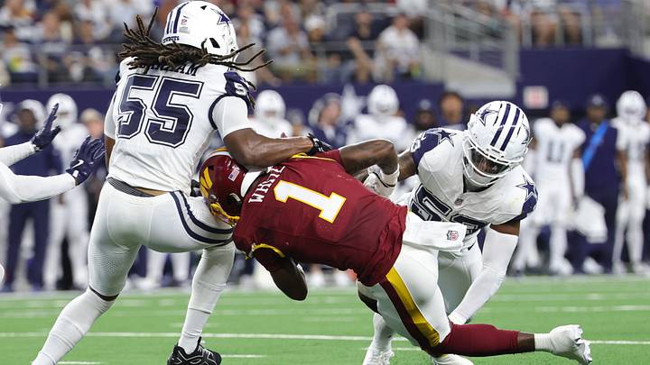 Washington Commanders running back Rachaad White (1) is tackled by Dallas Cowboys linebackers Jaishawn Barham (55) and Dee Winters (53) during the first half at AT&T Stadium. Mandatory Credit: Kevin Jairaj-Imagn Images Washington Commanders running back Rachaad White (1) is tackled by Dallas Cowboys linebackers Jaishawn Barham (55) and Dee Winters (53) during the first half at AT&T Stadium. Mandatory Credit: Kevin Jairaj-Imagn Images