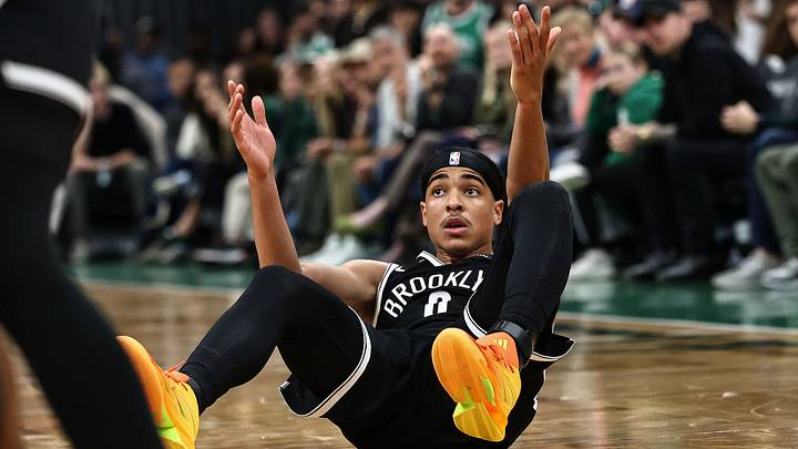 Oct 27, 2026; Boston, Massachusetts, USA; Brooklyn Nets guard Mikel Brown Jr. (0) sits on the floor after being knocked over on a missed three point attempt in overtime during their loss to the Boston Celtics at TD Garden. Mandatory Credit: Winslow Townson-Imagn Images Oct 27, 2026; Boston, Massachusetts, USA; Brooklyn Nets guard Mikel Brown Jr. (0) sits on the floor after being knocked over on a missed three point attempt in overtime during their loss to the Boston Celtics at TD Garden. Mandatory Credit: Winslow Townson-Imagn Images