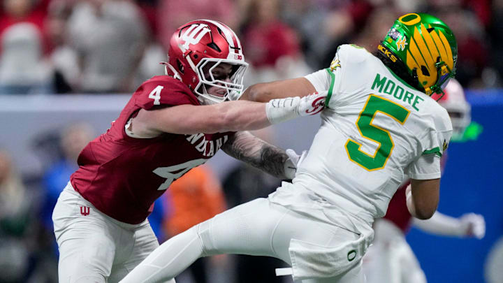 Indiana linebacker Aiden Fisher and his teammates stymied the Oregon offense, forcing turnovers and inconsistency