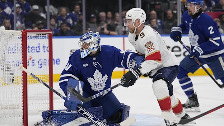 May 5, 2025; Toronto, Ontario, CAN; Toronto Maple Leafs goaltender Anthony Stolarz (41) and Florida Panthers forward Sam Bennett (9) battle for position in front of the goal during the second period of the second round of the 2025 Stanley Cup Playoffs at Scotiabank Arena. Mandatory Credit: John E. Sokolowski-Imagn Images