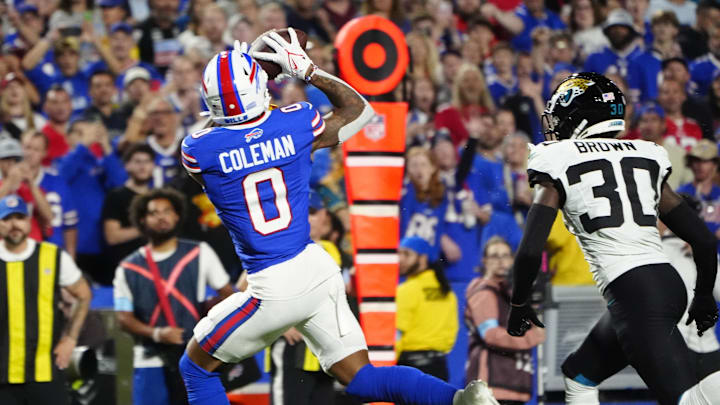 Sep 23, 2024; Orchard Park, New York, USA; Buffalo Bills wide receiver Keon Coleman (0) makes a catch and scores a touchdown against the Jacksonville Jaguars during the first half at Highmark Stadium. Sep 23, 2024; Orchard Park, New York, USA; Buffalo Bills wide receiver Keon Coleman (0) makes a catch and scores a touchdown against the Jacksonville Jaguars during the first half at Highmark Stadium.