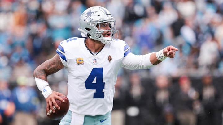 Dallas Cowboys quarterback Dak Prescott communicates against the Carolina Panthers at Bank of America Stadium.