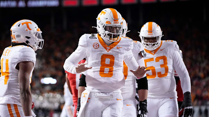 Tennessee Volunteers quarterback Nico Iamaleava (8) celebrates a touchdown during the first half of the College Football Playoff first round game against the Ohio State Buckeyes at Ohio Stadium in Columbus on Dec. 21, 2024.