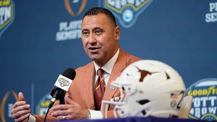 Texas Longhorns head coach Steve Sarkisian speaks during a press conference prior to the Cotton Bowl. Texas Longhorns head coach Steve Sarkisian speaks during a press conference prior to the Cotton Bowl.