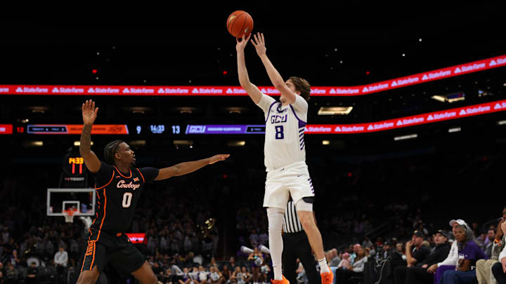 Dec 6, 2025; Phoenix, Arizona, USA; Grand Canyon University Antelopes guard Dusty Stromer (8) attempts a 3-point shot against the Oklahoma State Cowboys during the first half at PHX Arena Dec 6, 2025; Phoenix, Arizona, USA; Grand Canyon University Antelopes guard Dusty Stromer (8) attempts a 3-point shot against the Oklahoma State Cowboys during the first half at PHX Arena