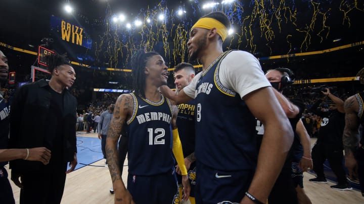 May 3, 2022; Memphis, Tennessee, USA; Memphis Grizzlies guard Ja Morant (12) reacts with forward Ziaire Williams (8) after defeating the Golden State Warriors during game two of the second round for the 2022 NBA playoffs at FedExForum. 