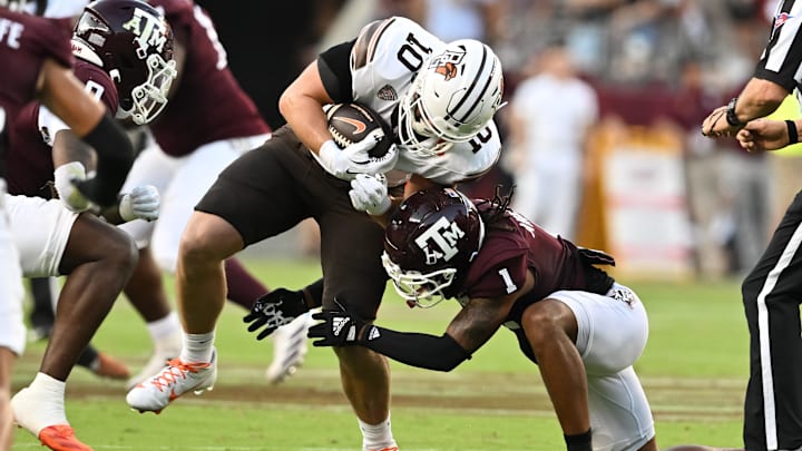 Bowling Green Falcons tight end Levi Gazarek (10) is tackled by Texas A&M Aggies defensive back Bryce Anderson (1) during the first quarter at Kyle Field. Bowling Green Falcons tight end Levi Gazarek (10) is tackled by Texas A&M Aggies defensive back Bryce Anderson (1) during the first quarter at Kyle Field.