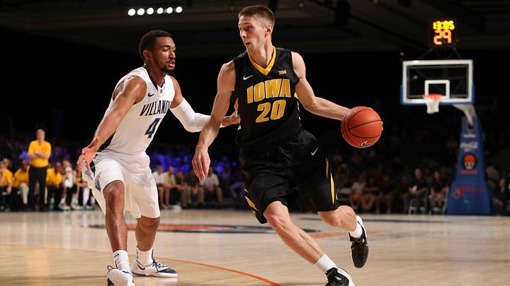 Nov 30, 2013; Paradise Island, BAHAMAS; Iowa Hawkeyes forward Jarrod Uthoff (20) dribbles as Villanova Wildcats guard Darrun Hilliard (4) defends during the game in the 2013 Battle 4 Atlantis Championship game in the Imperial Arena at the Atlantis Resort. Villanova won 88-83. Mandatory Credit: Kevin Jairaj-USA TODAY Sports Nov 30, 2013; Paradise Island, BAHAMAS; Iowa Hawkeyes forward Jarrod Uthoff (20) dribbles as Villanova Wildcats guard Darrun Hilliard (4) defends during the game in the 2013 Battle 4 Atlantis Championship game in the Imperial Arena at the Atlantis Resort. Villanova won 88-83. Mandatory Credit: Kevin Jairaj-USA TODAY Sports