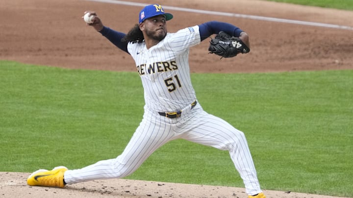 Jul 25, 2025; Milwaukee, Wisconsin, USA; Milwaukee Brewers pitcher Freddy Peralta (51) delivers a pitch against the Miami Marlins in the second inning at American Family Field. Mandatory Credit: Michael McLoone-Imagn Images