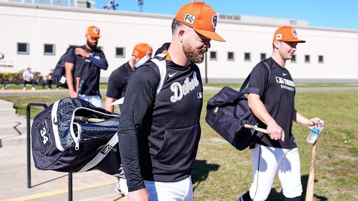Detroit Tigers catcher Jake Rogers, center, and infielder Trey Sweeney walk towards the field for practice during spring training at TigerTown in Lakeland, Fla. on Monday, Feb. 17, 2025.