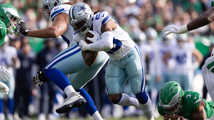 Dec 29, 2024; Philadelphia, Pennsylvania, USA; Dallas Cowboys running back Rico Dowdle (23) runs with the ball against the Philadelphia Eagles during the first quarter at Lincoln Financial Field. Mandatory Credit: Bill Streicher-Imagn Images