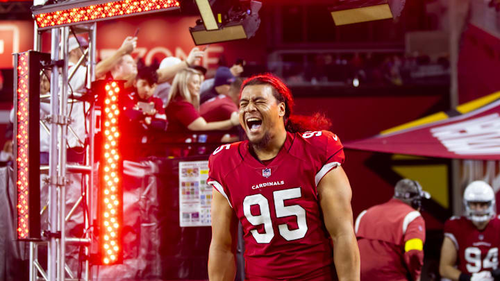 Dec 12, 2022; Glendale, Arizona, USA; Arizona Cardinals defensive tackle Leki Fotu (95) reacts against the New England Patriots at State Farm Stadium. Mandatory Credit: Mark J. Rebilas-Imagn Images Dec 12, 2022; Glendale, Arizona, USA; Arizona Cardinals defensive tackle Leki Fotu (95) reacts against the New England Patriots at State Farm Stadium. Mandatory Credit: Mark J. Rebilas-Imagn Images