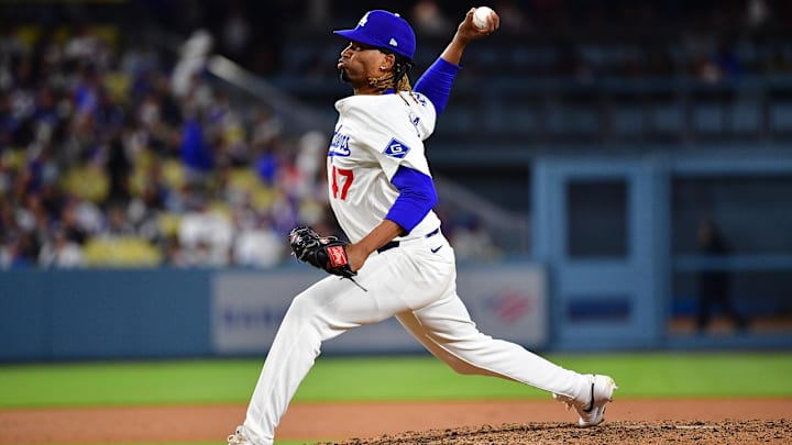 June 3, 2025; Los Angeles, California, USA; Los Angeles Dodgers relief pitcher Jose Urena (47) throws against the New York Mets during the ninth inning at Dodger Stadium. Mandatory Credit: Gary A. Vasquez-Imagn Images