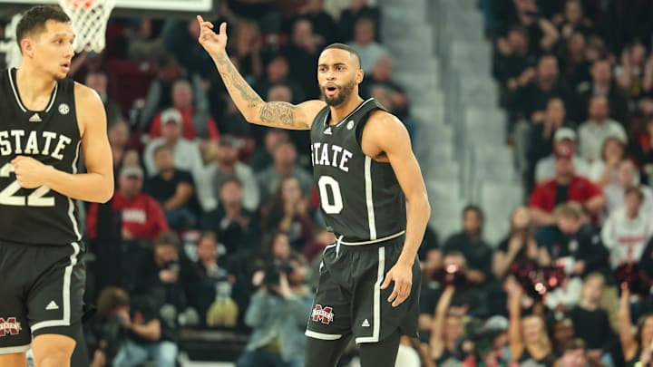 Jan 29, 2025; Starkville, Mississippi, USA; Mississippi State Bulldogs guard Claudell Harris Jr. (0) reacts after a three point basket against the Alabama Crimson Tide during the second half at Humphrey Coliseum. Mandatory Credit: Wesley Hale-Imagn Images
