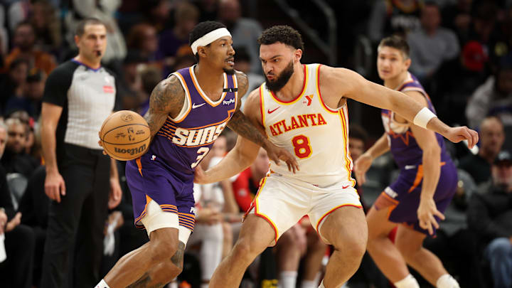 Jan 9, 2025; Phoenix, Arizona, USA; Atlanta Hawks forward David Roddy (8) against Phoenix Suns guard Bradley Beal (3) at Footprint Center. Mandatory Credit: Mark J. Rebilas-Imagn Images