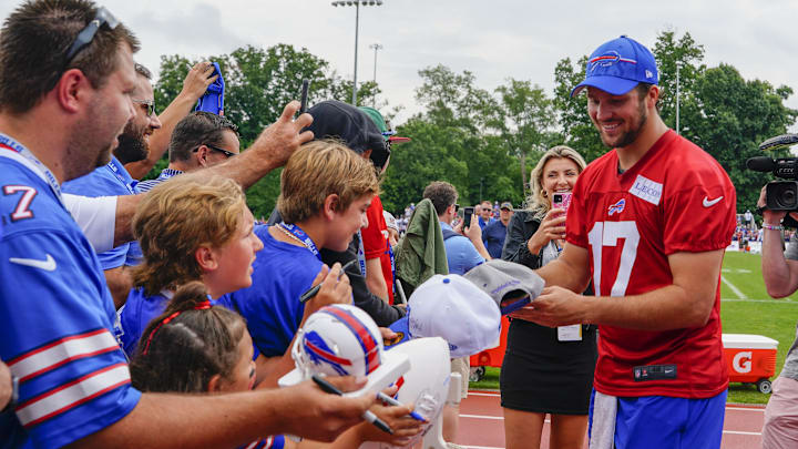 Jul 27, 2023; Rochester NY, USA; Buffalo Bills quarterback Josh Allen (17) signs autographs for fans