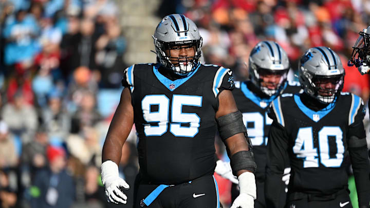 Jan 7, 2024; Charlotte, North Carolina, USA;  Carolina Panthers defensive tackle Derrick Brown (95) reacts in the third quarter at Bank of America Stadium. Mandatory Credit: Bob Donnan-Imagn Images
