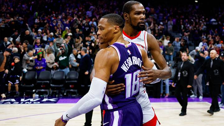 Dec 21, 2025; Sacramento, California, USA; Houston Rockets forward Kevin Durant (7) and Sacramento Kings guard Russell Westbrook (18) hug after the game at Golden 1 Center. Mandatory Credit: Sergio Estrada-Imagn Images