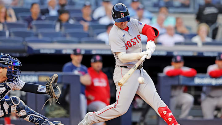 Sep 30, 2025; Bronx, New York, USA; Boston Red Sox third base Alex Bregman (2) hits a single during the first inning against the New York Yankees during game one of the Wildcard round for the 2025 MLB playoffs at Yankee Stadium. Mandatory Credit: Brad Penner-Imagn Images Sep 30, 2025; Bronx, New York, USA; Boston Red Sox third base Alex Bregman (2) hits a single during the first inning against the New York Yankees during game one of the Wildcard round for the 2025 MLB playoffs at Yankee Stadium. Mandatory Credit: Brad Penner-Imagn Images
