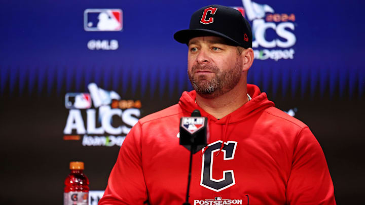 Oct 14, 2024; Bronx, New York, USA; Cleveland Guardians manager Stephen Vogt  listens during a press conference before playing against the New York Yankees in game one of the ALCS for the 2024 MLB Playoffs at Yankee Stadium. Mandatory Credit: Vincent Carchietta-Imagn Images