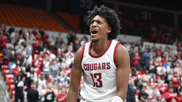 Feb 15, 2024; Pullman, Washington, USA; Washington State Cougars forward Isaac Jones (13) celebrates.