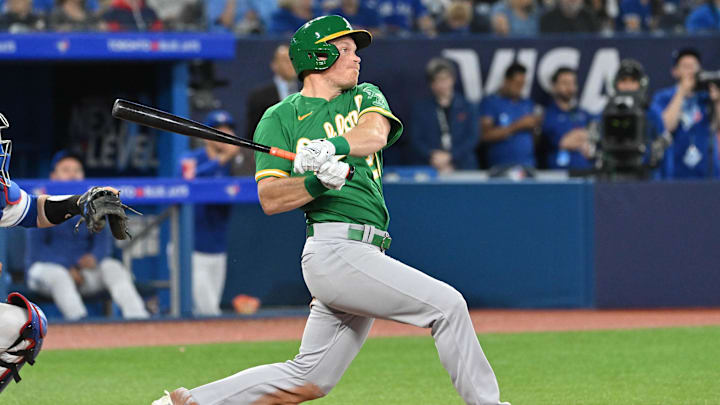 Jun 23, 2023; Toronto, Ontario, CAN; Oakland Athletics left fielder Conner Capel (21) hits a double against the Toronto Blue Jays in the seventh inning at Rogers Centre. Mandatory Credit: Dan Hamilton-Imagn Images Jun 23, 2023; Toronto, Ontario, CAN; Oakland Athletics left fielder Conner Capel (21) hits a double against the Toronto Blue Jays in the seventh inning at Rogers Centre. Mandatory Credit: Dan Hamilton-Imagn Images