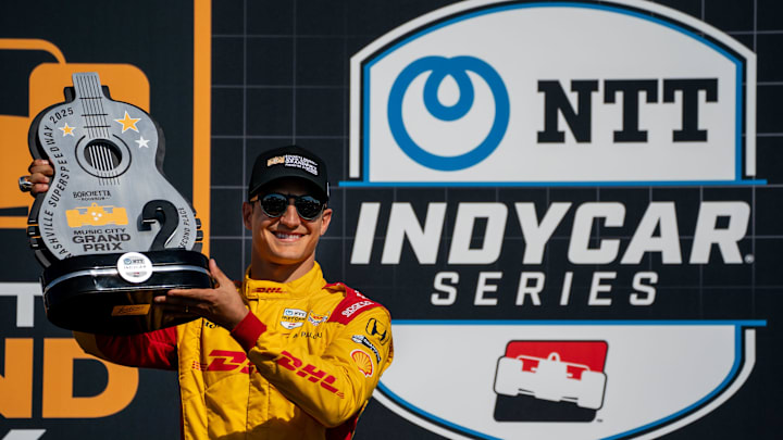 NTT IndyCar Series driver Alex Palou holds his second place trophy after the Music City Grand Prix at the Nashville Superspeedway in Lebanon, Tenn., Sunday, Aug. 31, 2025. NTT IndyCar Series driver Alex Palou holds his second place trophy after the Music City Grand Prix at the Nashville Superspeedway in Lebanon, Tenn., Sunday, Aug. 31, 2025.