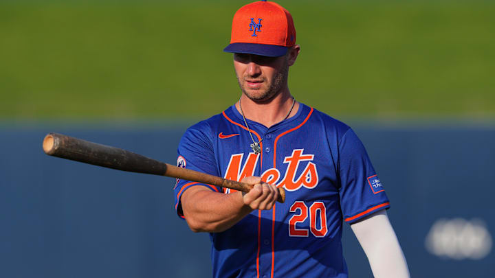 Mar 12, 2024; West Palm Beach, Florida, USA;  New York Mets first baseman Pete Alonso (20) warms-up