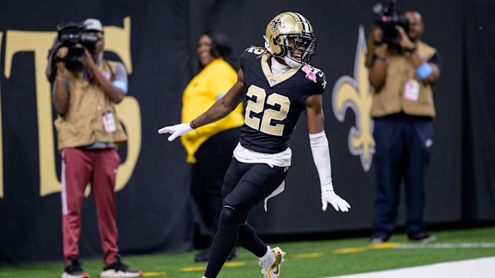 Oct 13, 2024; New Orleans, Louisiana, USA; New Orleans Saints wide receiver Rashid Shaheed (22) returns a punt for a touchdown during the second quarter against the Tampa Bay Buccaneers at Caesars Superdome. Mandatory Credit: Matthew Hinton-Imagn Images
