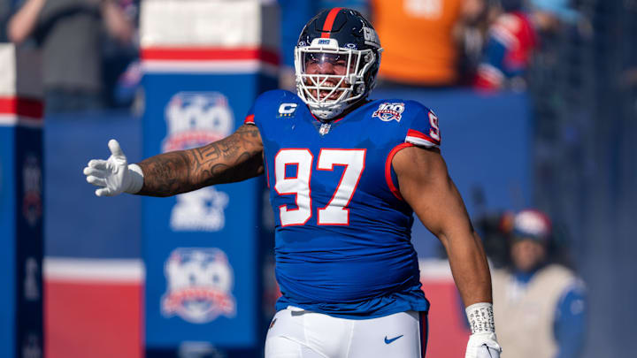 New York Giants defensive tackle Dexter Lawrence II (97) runs out of the tunnel prior to the start of the game between the New York Giants and the Washington Commanders at MetLife Stadium in East Rutherford on Sunday, Nov. 3, 2024.