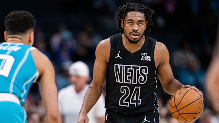 Mar 8, 2025; Charlotte, North Carolina, USA; Brooklyn Nets guard Cam Thomas (24) brings the ball up court against the Charlotte Hornets during the first quarter at Spectrum Center. Mandatory Credit: Scott Kinser-Imagn Images