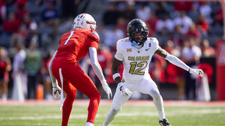 Oct 19, 2024; Tucson, Arizona, USA; Colorado Buffalos wide receiver Travis Hunter (12) against Arizona Wildcats cornerback Tacario Davis (1) at Arizona Stadium.
