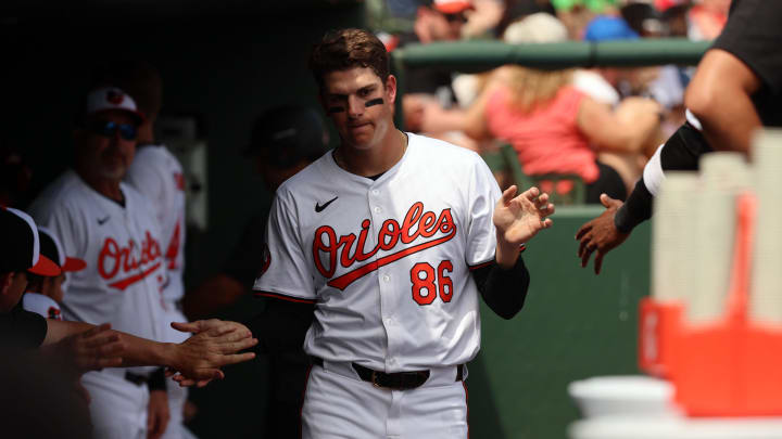 Mar 16, 2024; Sarasota, Florida, USA; Baltimore Orioles infielder Coby Mayo (86) scores a run during the fifth inning against the Boston Red Sox at Ed Smith Stadium. Mar 16, 2024; Sarasota, Florida, USA; Baltimore Orioles infielder Coby Mayo (86) scores a run during the fifth inning against the Boston Red Sox at Ed Smith Stadium.