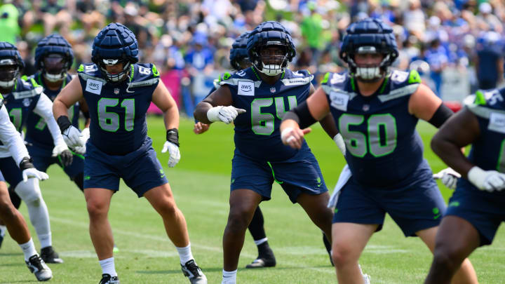 Jul 27, 2024; Renton, WA, USA; Seattle Seahawks guard Christian Haynes (64) during training camp at Virginia Mason Athletic Center. Jul 27, 2024; Renton, WA, USA; Seattle Seahawks guard Christian Haynes (64) during training camp at Virginia Mason Athletic Center.