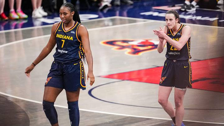 Indiana Fever guard Caitlin Clark (22) claps her hands in excitement with Indiana Fever forward Aliyah Boston (7) on Sunday, July 13, 2025, during the game at Gainbridge Fieldhouse in Indianapolis.