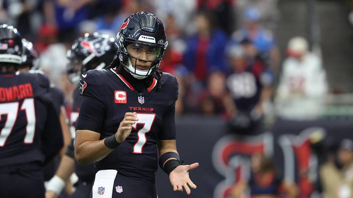 Jan 11, 2025; Houston, Texas, USA; Houston Texans quarterback C.J. Stroud (7) reacts after a play during the second quarter against the Los Angeles Chargers in an AFC wild card game at NRG Stadium. Mandatory Credit: Troy Taormina-Imagn Images