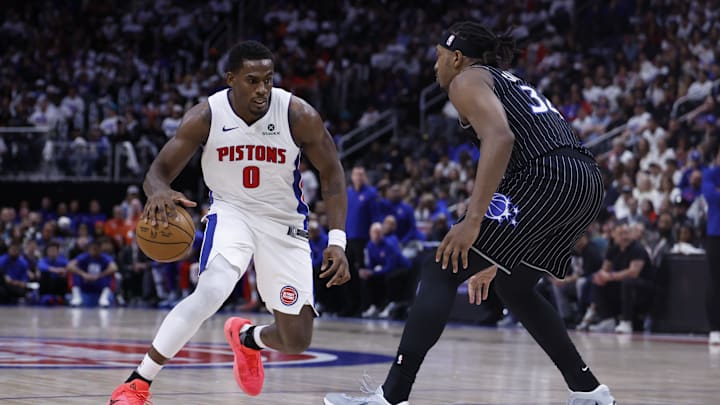 Apr 19, 2026; Detroit, Michigan, USA; Detroit Pistons center Jalen Duren (0) dribbles defended by Orlando Magic center Wendell Carter Jr. (34) in the second half during the 2026 NBA Playoffs at Little Caesars Arena. Mandatory Credit: Rick Osentoski-Imagn Images