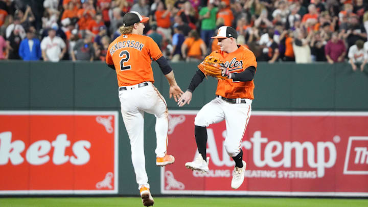 Sep 16, 2023; Baltimore, Maryland, USA; Baltimore Orioles shortstop Gunnar Henderson (2) and Austin Hays celebrate after a win