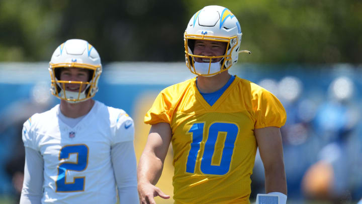 May 29, 2024; Costa Mesa, CA, USA; Los Angeles Chargers quarterback Justin Herbert (10) and quarterback Easton Stick (2) during organized team activities at Hoag Performance Center. Mandatory Credit: Kirby Lee-USA TODAY Sports